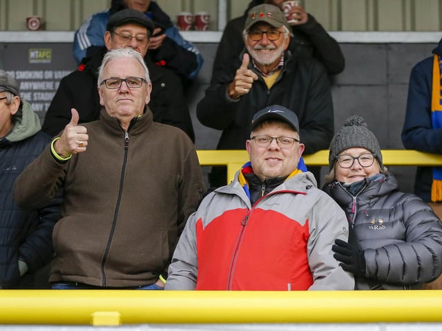 Mansfield fans at The EnviroVent Stadium for the match against Harrogate Town.