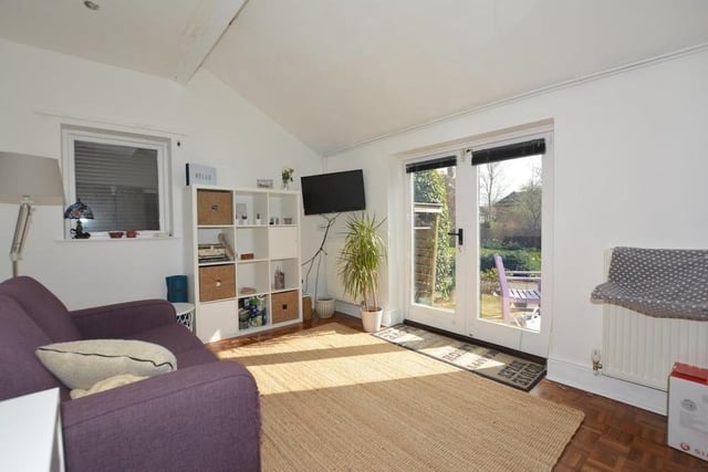 This image shows there is plenty of size and style to the annexe. Double-glazed double doors lead out into the garden.