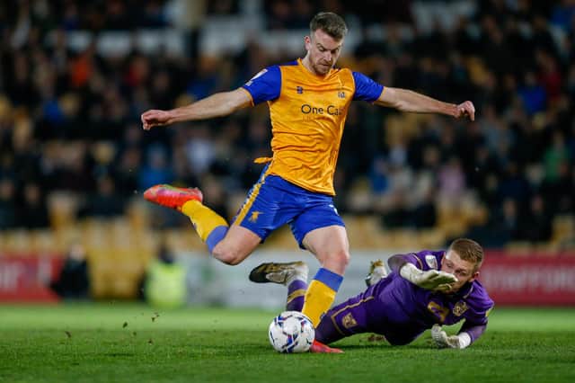 Rhys Oates rounds Aidan Stone to put Stags ahead at Vale Park tonight. Photo by Chris Holloway/The Bigger Picture.media