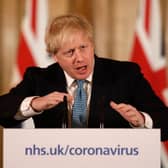 British Prime Minister Boris Johnson gives a press conference (Photo by Matt Dunham - WPA Pool/Getty Images)