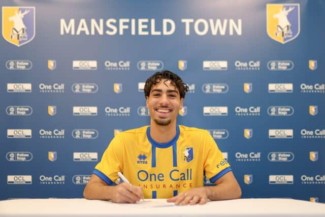 George Abbott signs for the Stags on Monday. Photo by Chris & Jeanette Holloway / The Bigger Picture.media