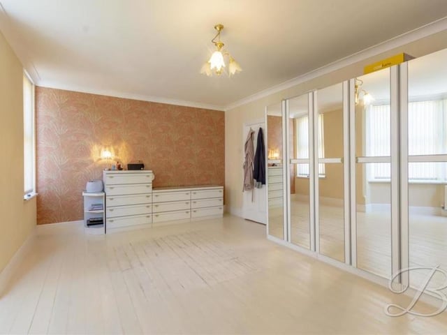 The master bedroom has space and style, as this second photo underlines. There is plenty of room for wardrobes, cupboards and drawers.