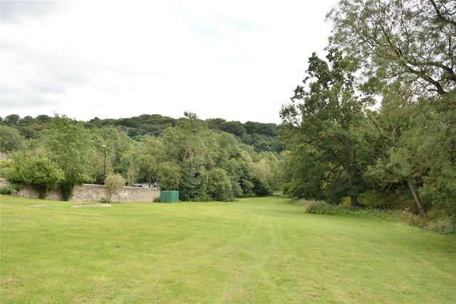 The property is set in a plot of approximately 2.2 acres and is surrounded by woodland, providing both a picturesque and peaceful spot to live.
