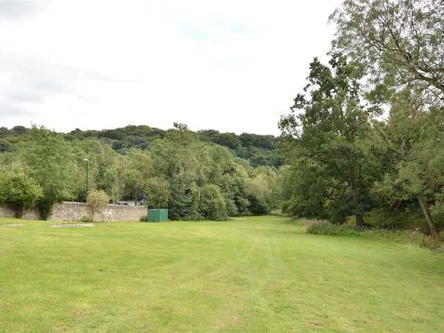 The property is set in a plot of approximately 2.2 acres and is surrounded by woodland, providing both a picturesque and peaceful spot to live.