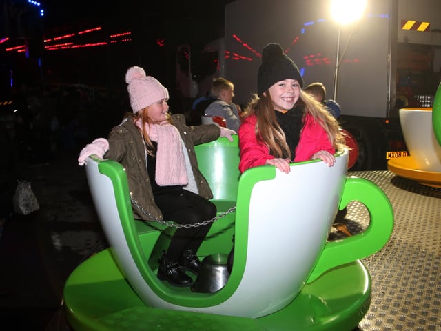 On the cup ride are sisters Elsie and Charlie Laykin in 2019.