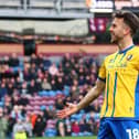 Rhys Oates celebrates during the English FA Cup fourth round football match between Burnley and Mansfield Town at Turf Moor in Burnley on February 14, 2026. (Photo by Paul Currie / AFP via Getty Images)