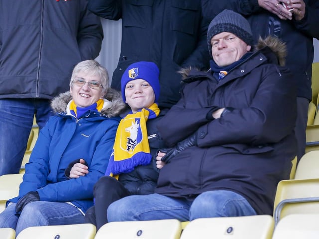 Mansfield fans at The EnviroVent Stadium for the match against Harrogate Town.
