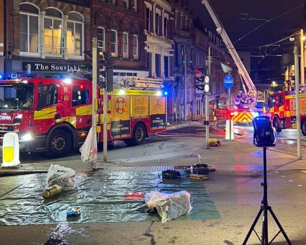 Firefighters attending a residential property on Market Street, Nottingham.