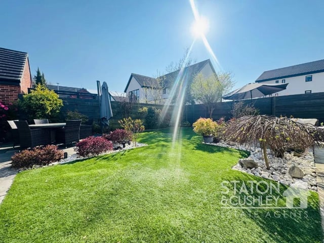 To the rear the garden has been landscaped to a stunning standard and offers an array of beautiful trees and shrubs as well as an easy maintenance lawn and patio area creating the perfect haven to enjoy all year round.