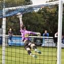 Man-of-the-match Hugo Warhurst makes a crucial save in thewin over Cleethorpes Town. Pic by Peter Craggs.