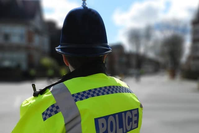 A man has been arrested after an elderly lady was robbed in Notts.