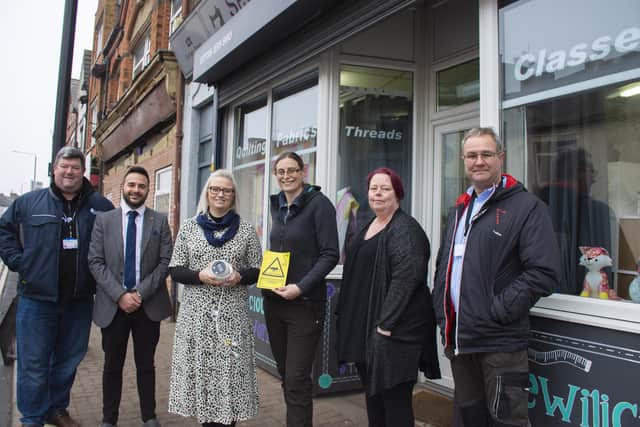 From left, Wayne Bennett, of Ashfield Council, council community safety manager Antonio Taylor, Sewilicious Fabrics owner Jenny Tindall, Coun Helen-Ann Smith, Sewilicious manager Fiona Asbury and Andy Sheppard, from Action Alarms.