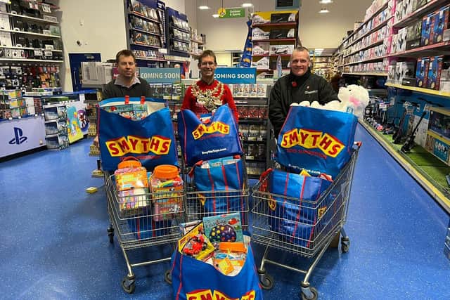 Wayne Leatherland, Smyths manager, Executive Mayor Andy Abrahams and Mansfield BID’s Daryl McGreade