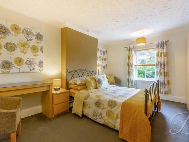 The second bedroom, which overlooks the front of the Kirkby property, is an exquisite, individual space, with carpeted floor and coving to the ceiling.
