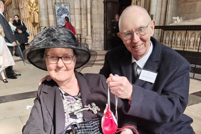 Gordon Foster, with wife Joan, after he had been presented with Royal Maundy money by King Charles III at York Minster last month to mark his 50 years as a church organist in Rainworth.