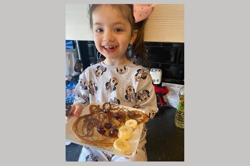 Lola shows off her Peppa Pig pancake.