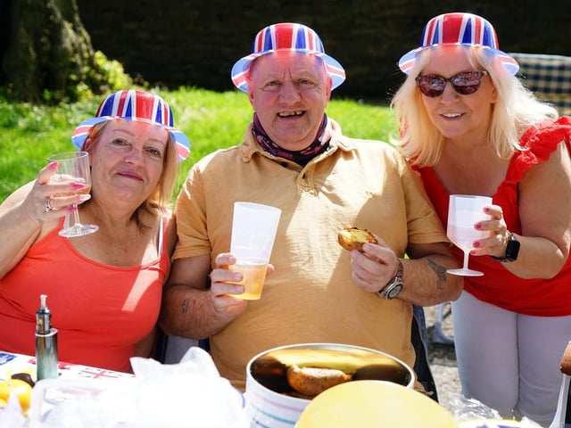Mags Pritchard is pictured with Chris and Ian Crew at Teversal's coronation street party event.