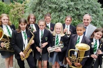 The Ravensdale School band is pictured here in 2001. The school was demolished after it closed that same year and the site remained derelict and unused for several years.