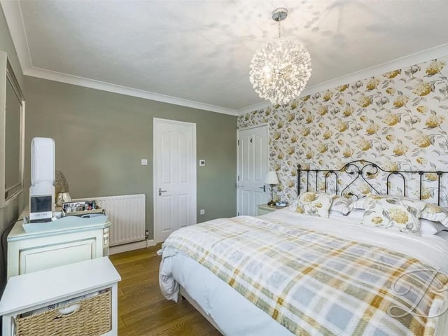 One of six bedrooms in the spacious property