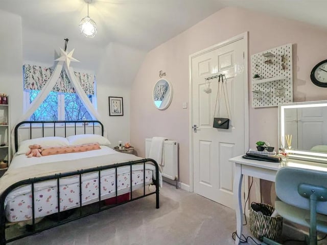 One of four bedrooms in the spacious property, ideal for a growing family.