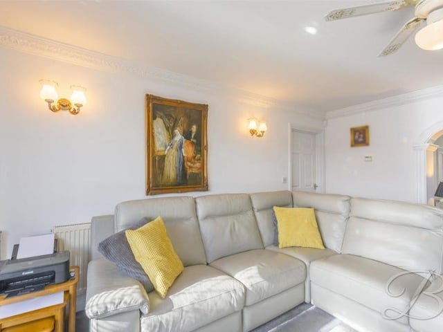 The lounge/diner provides the ideal social space. Decorated in a neutral colour palette, it boasts a carpeted floor, central heating radiators and a ceiling fan.
