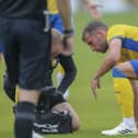 Baily Cargill receives treatment during the pre-season match against Rotherham Utd at the One Call Stadium, 22 July 2023  
Photo credit : Chris & Jeanette Holloway / The Bigger Picture.media