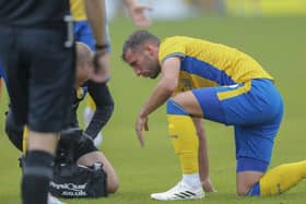 Baily Cargill receives treatment during the pre-season match against Rotherham Utd at the One Call Stadium, 22 July 2023  
Photo credit : Chris & Jeanette Holloway / The Bigger Picture.media