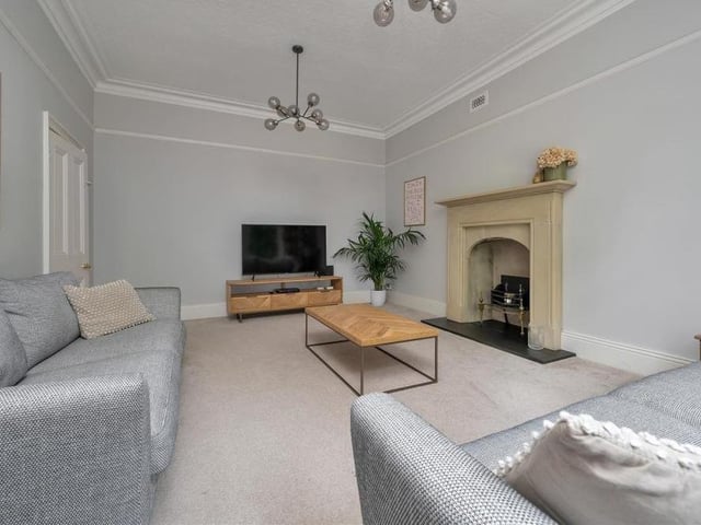Like the rest of the ground floor, the elegant lounge has underfloor heating. There is also coving to the ceiling.