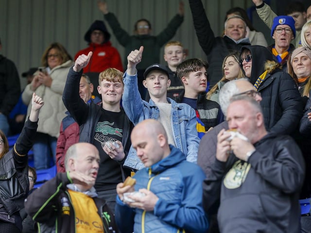 Mansfield Town fans enjoy victory at Tranmere Rovers.