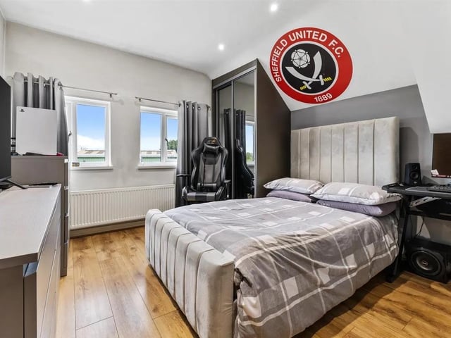 The property boasts ample bedroom space for a growing family
