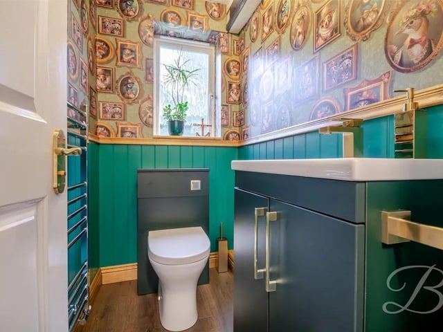 The downstairs benefits from a handy toilet with a low flush WC and hand wash basin.