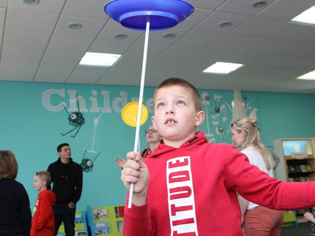 Plate spinning was just one of the circus skills to try. Here is Caedyn Goucher giving it a go.