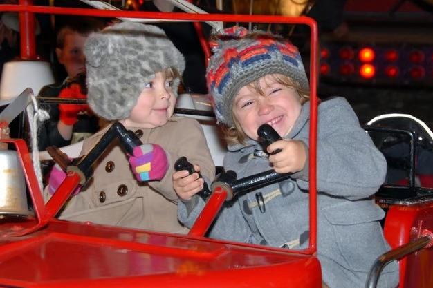 Three-year-old Bilsthorpe twins Tulip and Noah Wood have a brilliant time riding on the fire engine at the 2017 Berry Hill Park Halloween fireworks display