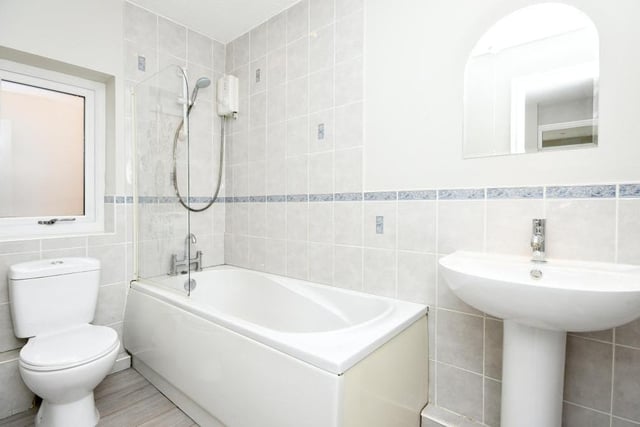 The family bathroom also sits on the first floor. It is compact but contains a bath, wash hand basin and low-flush WC