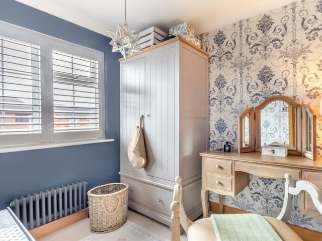 Here is the last of the four bedrooms, which has space for a wardrobe and a dressing table.