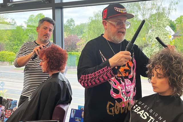 Students were able to ask the stylists questions as they worked.