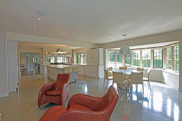 The breakfast area has a wide bay window and view over the driveway and front garden.