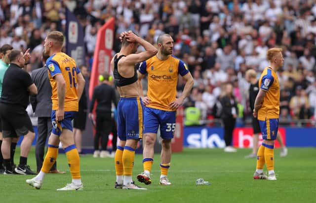 Stags players are heartbroken at the final whistle.