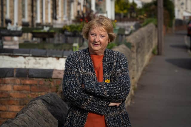 Kath Sharpe standing on Portland Road, she is the parish councillor in the village of Langwith.