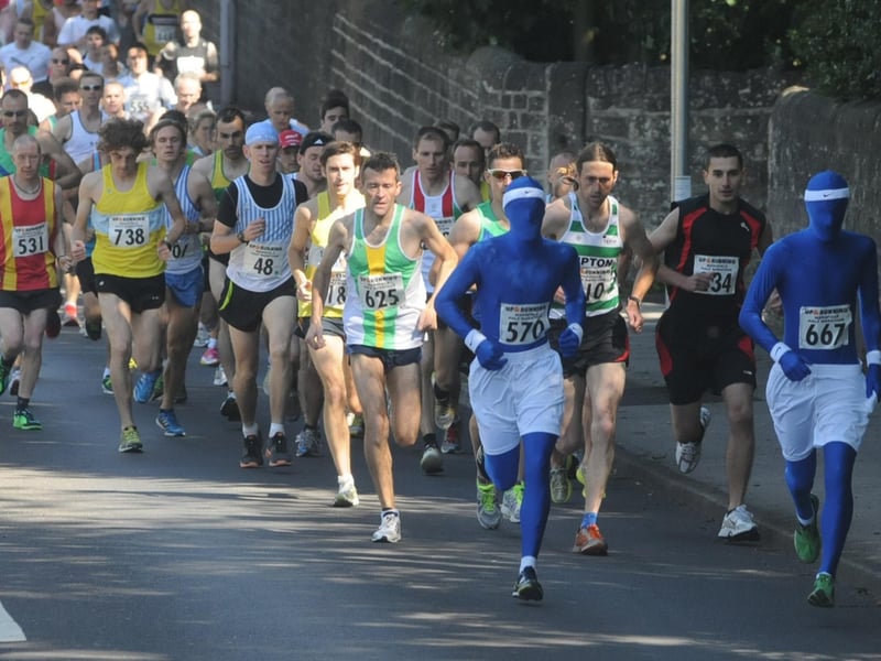 Thousands of runners have taken part in the Mansfield Half Marathon down the decades. Can you spot anyone you know here?