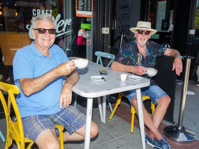 Tony Bailey and Alf Johnson enjoying a hot drink at Scarlet Tap, Southsea. Picture: Habibur Rahman
