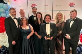 Simon Martin MBE, senior leader of ATTFE College (Centre) with colleagues from ATTFE College and the Together in Ashfield CIC celebrate their success