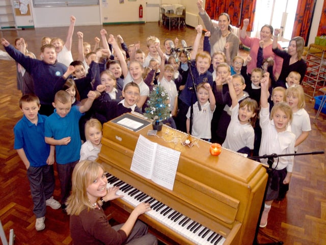 Staff and pupils at Sutton's Leamington School pictured during the recording of their Christmas CD