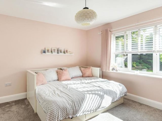 The fourth and final bedroom is another double. It boasts fitted wardrobes with extensive shelving.