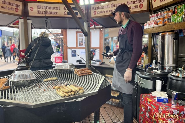 Catering stalls serve up hot food to keep shoppers warm this winter.