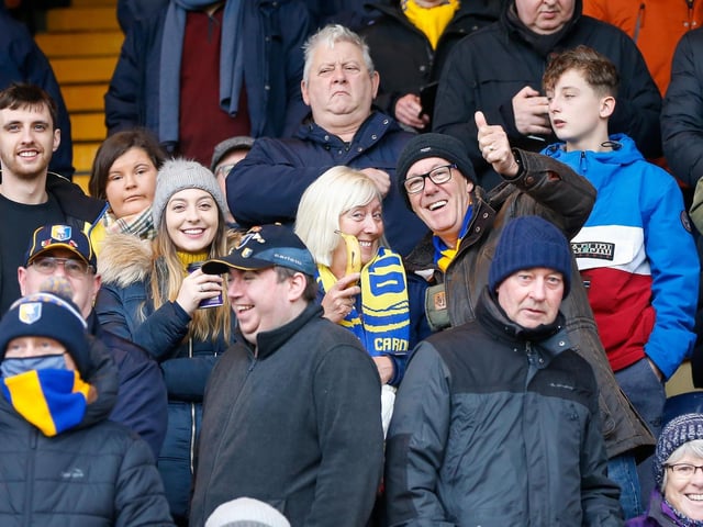 Mansfield Town fans at the One Call Stadium for the Emirates FA Cup third round match against Middlesbrough.