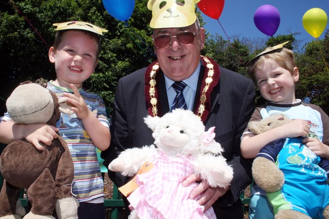 2009: The Mayor of Eastwood, Coun Keith Longdon, is pictured with two youngsters enjoying the teddy bear picnic, held at Watnall Pre-School.