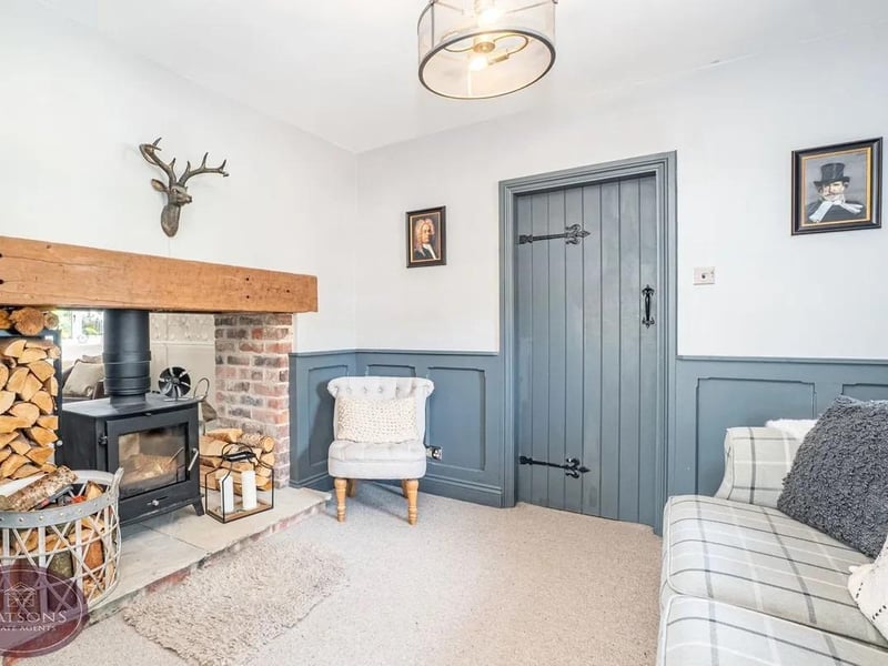 A double-sided multi-fuel burner creates a wonderful focal point between the snug and living room, adding both character and atmosphere.