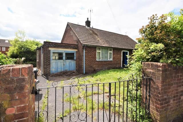 It looks rundown now, but is this two-bedroom bungalow on Eastfield Side, Sutton, worth taking on as a project? It is for sale at auction with estate agents Your Move, who have tabled a guide price of £144,000.