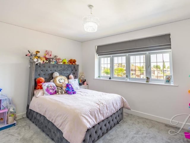 This cute bedroom is currently being used as a child's room.
